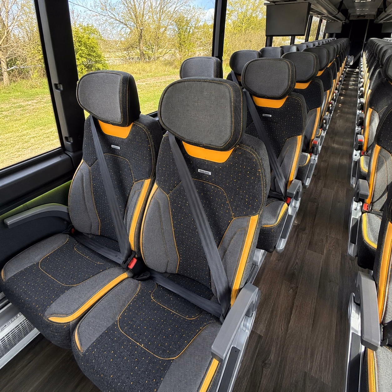 charter bus rentals between your lewisville ceremony and reception